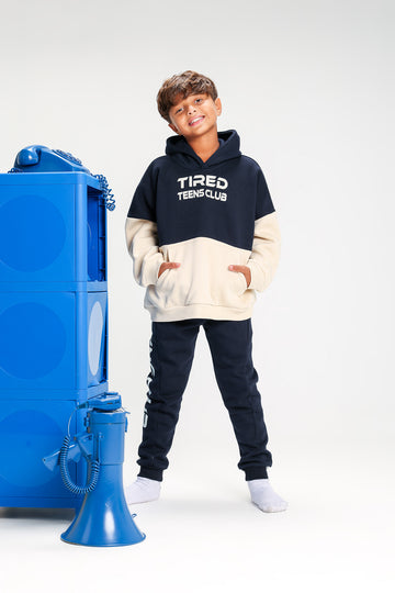 Boys’ Navy & Beige Melton Cotton Winter Tracksuit – “Tired Teens Club” Printed Hoodie & Pants Set