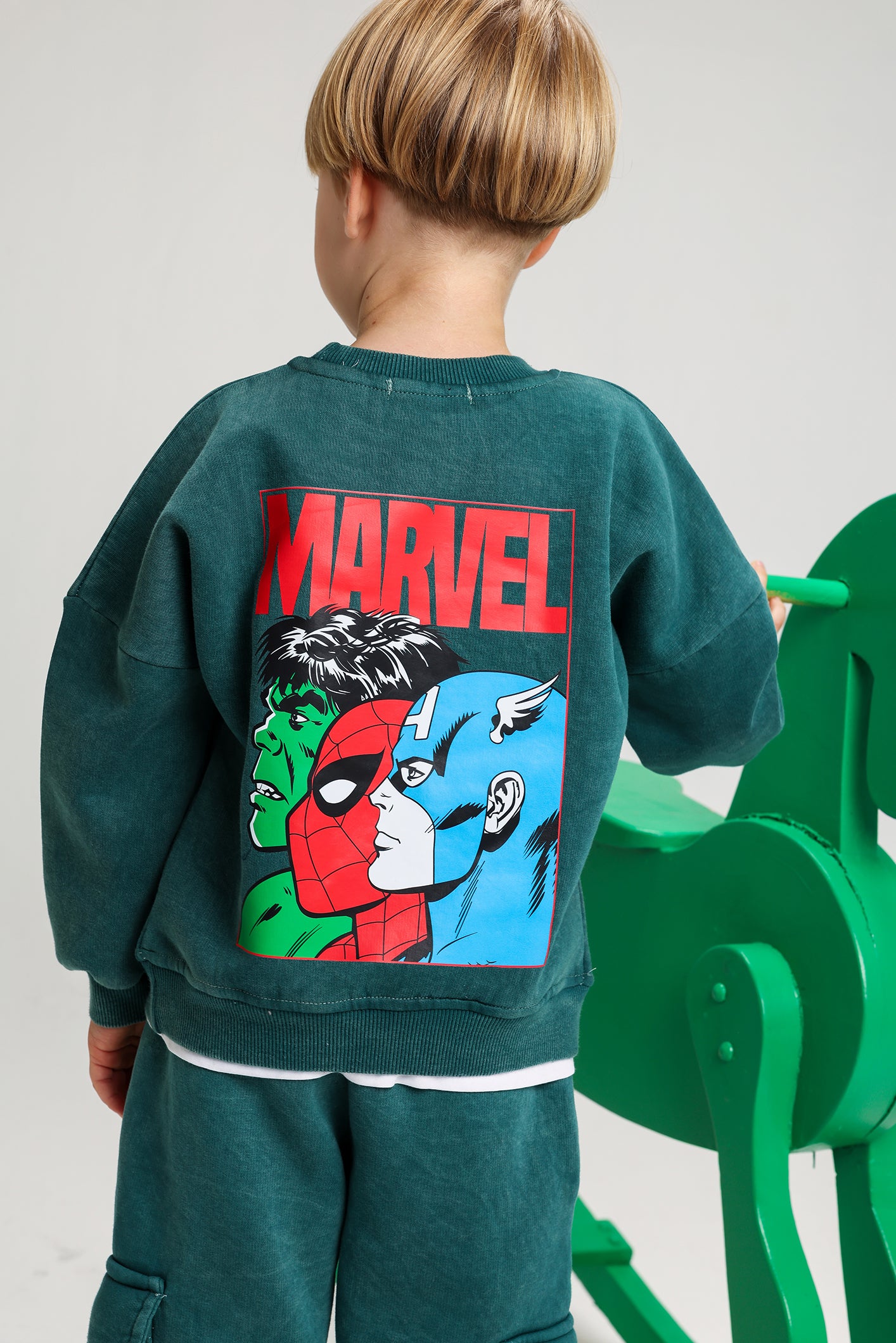Shop boys’ Marvel Comics Melton tracksuit – dark grey sweatshirt and cargo pants set. Cozy cotton fabric, stylish and warm for winter days.