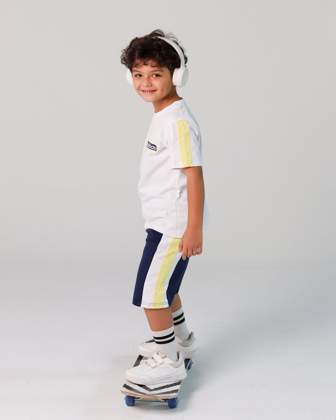 Adidas-Inspired Boys’ Summer Set – White Tee with Yellow Stripes & Navy Shorts