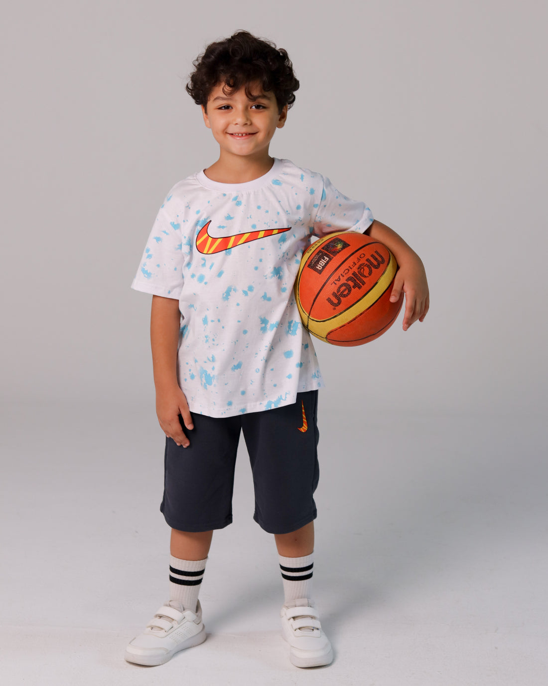 Boys' Nike Skate Set – White Splash Tee with Orange Swoosh & Dark Shorts