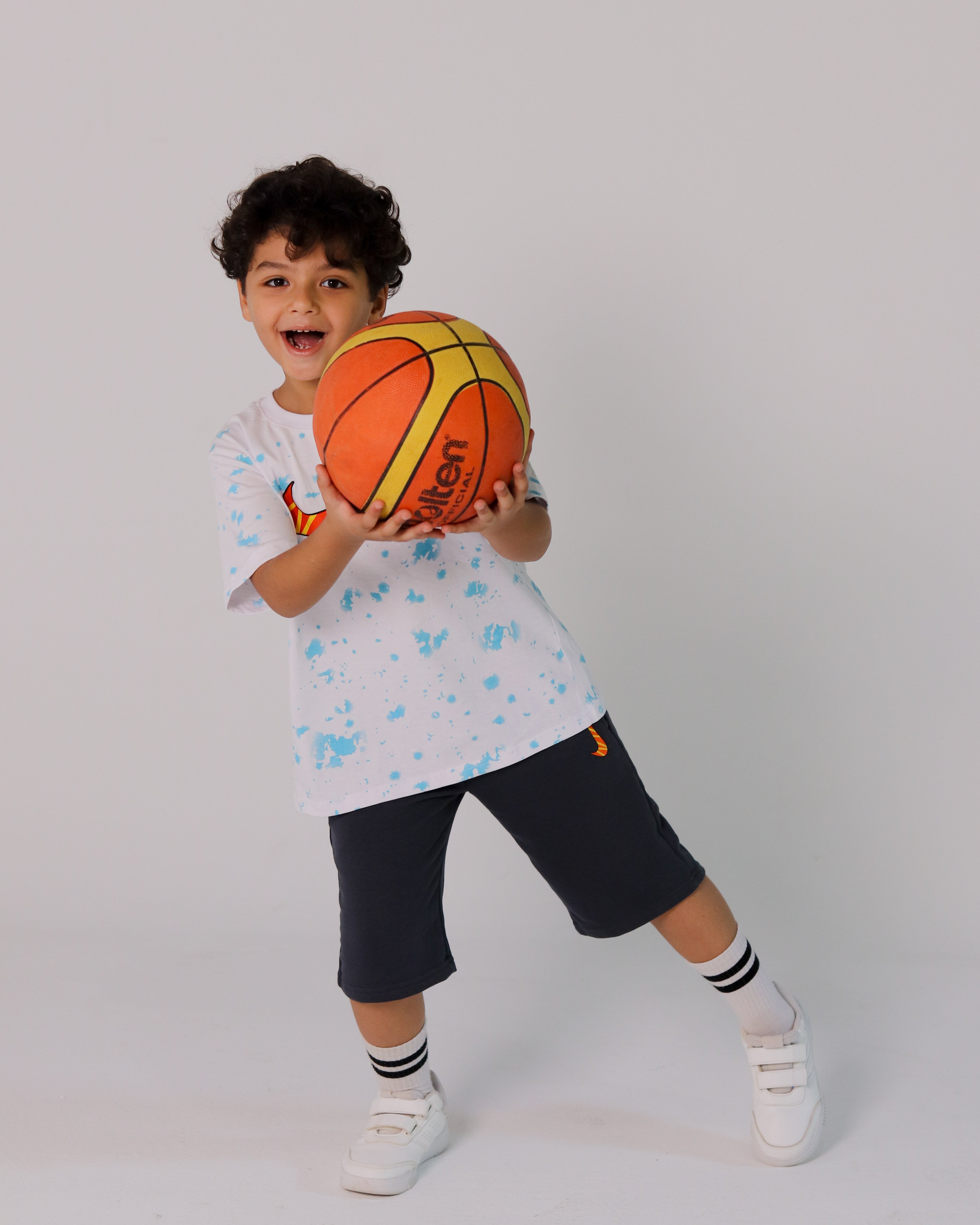 Boys' Nike Skate Set – White Splash Tee with Orange Swoosh & Dark Shorts