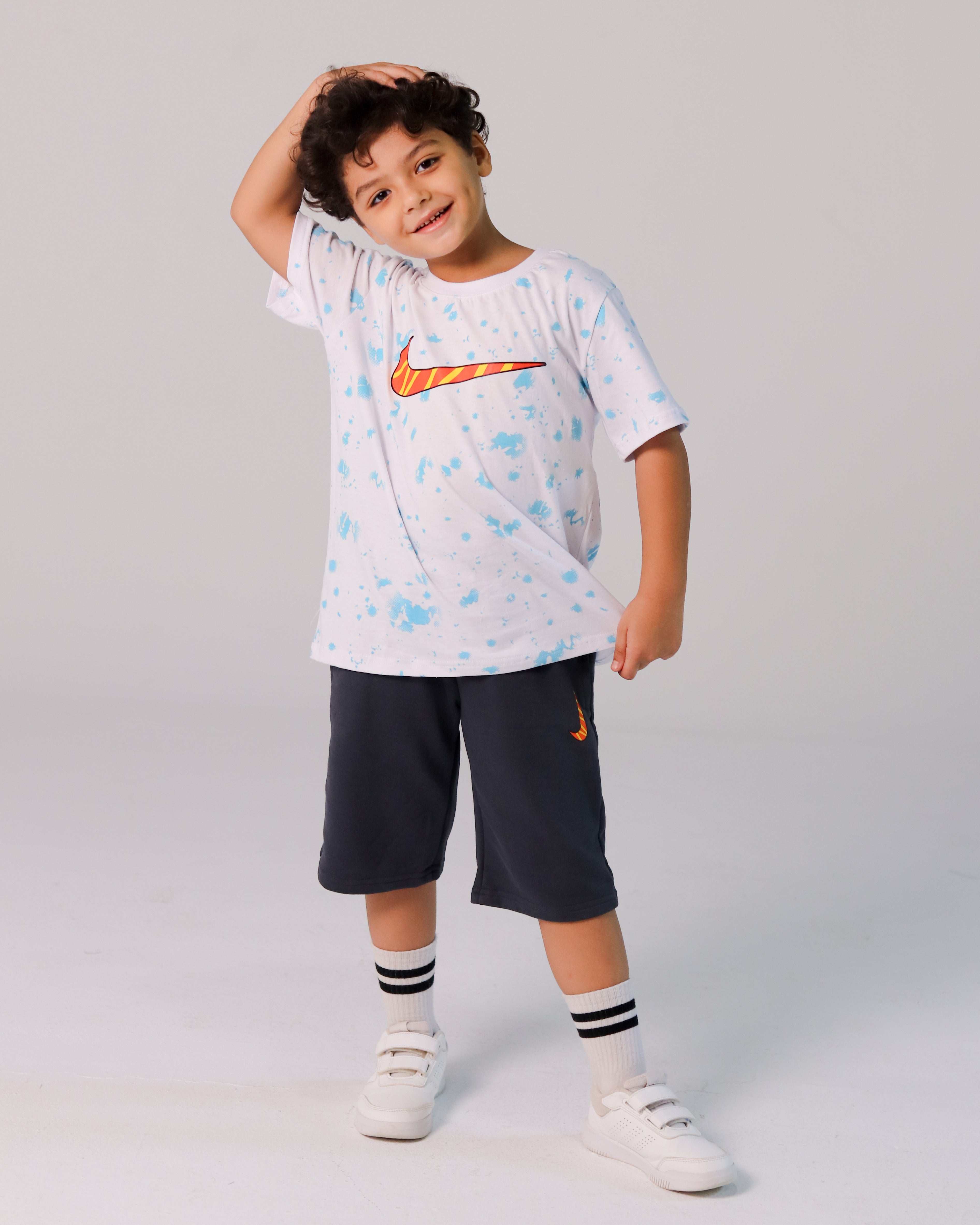 Boys' Nike Skate Set – White Splash Tee with Orange Swoosh & Dark Shorts