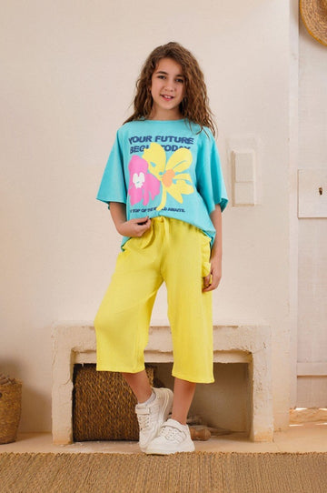 Girls Colorful Floral Summer Set – Oversized Tee & Yellow Wide-Leg Pants