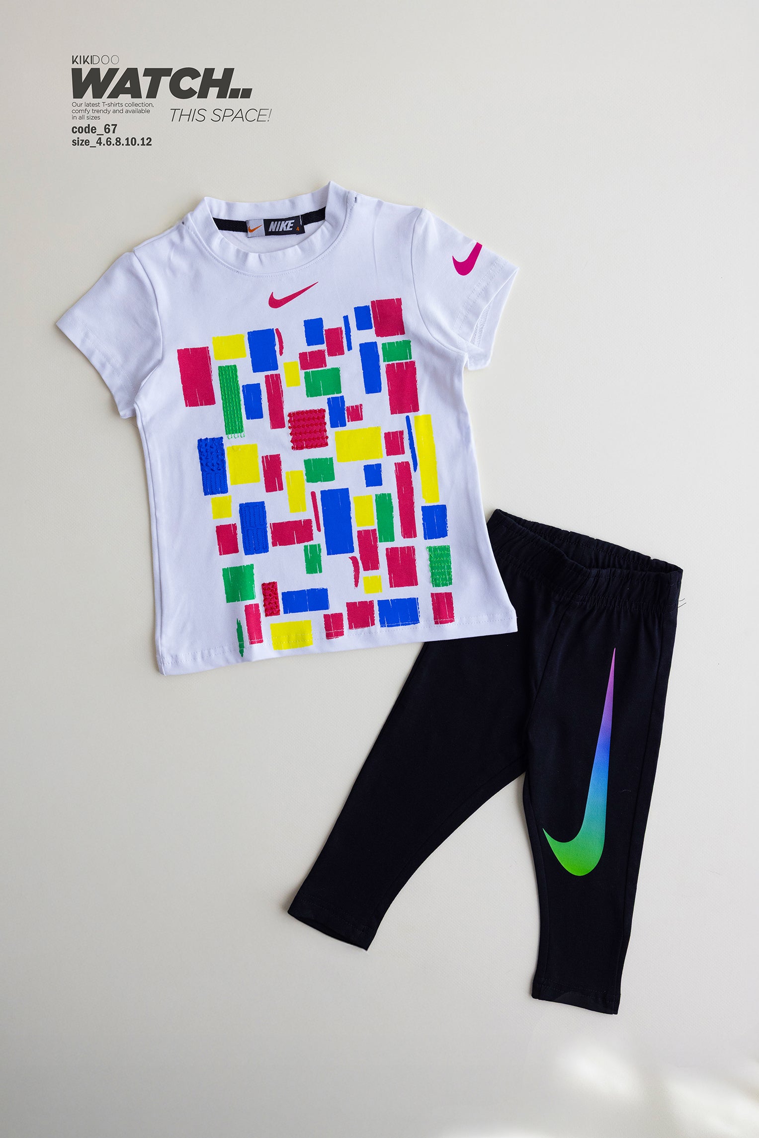 Girls’ Nike Color Block Set – White Graphic Tee & Black Rainbow Swoosh Leggings